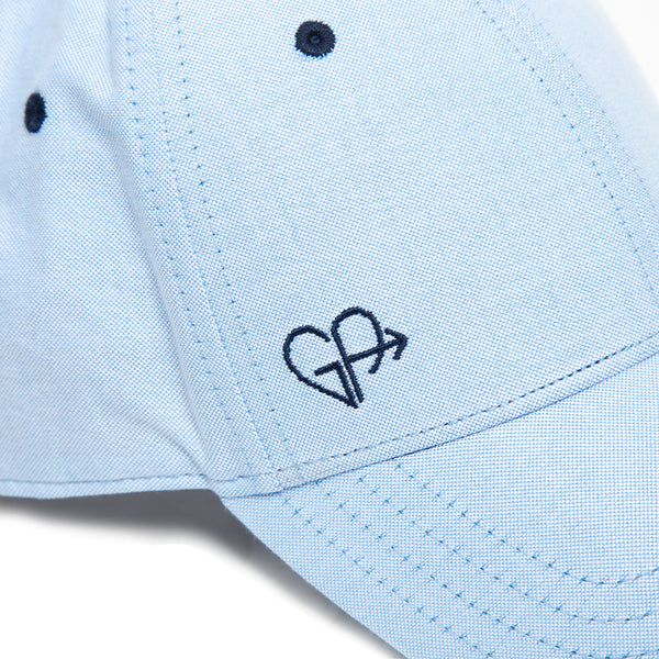 GA heart logo up close blue hat Galey Alix